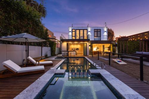 West Los Angeles House | 4BR Modern Oasis with Heated Pool Near SoFi Metro
