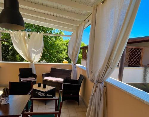 Lido di Capo Portiere Apartment | A CASA DI ELISA - Seaside Apartment - 100m from the beach