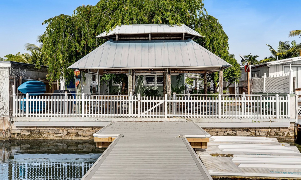 Key West House | Bayfront bungalow with private dock, kayaks, SUPs, tiki hut & pool access