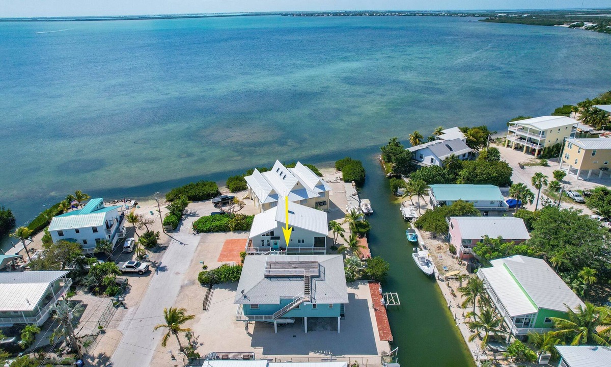 Cutthroat Harbor Estates House | Beautifully Renovated with Stunning Sunset Views and Dockage!