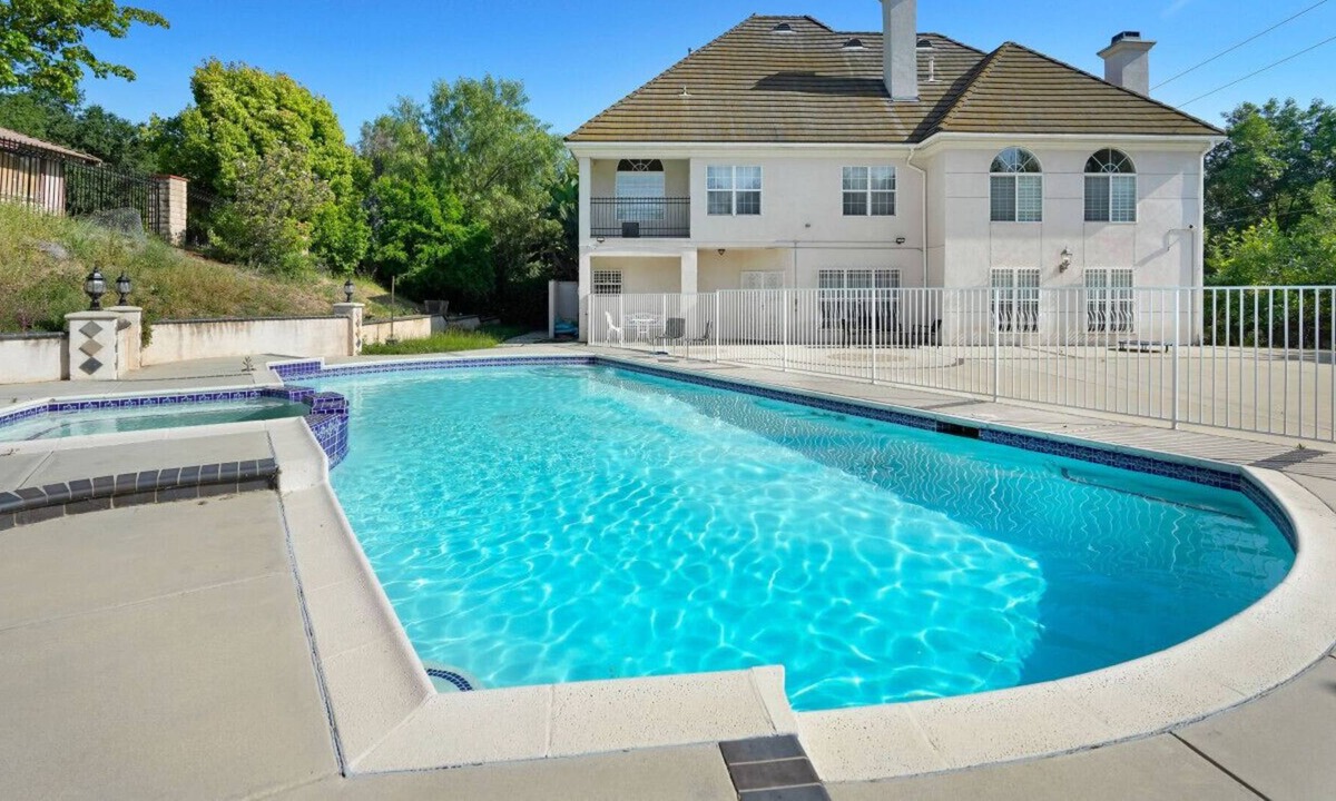 West Covina House | Captivating Chateau Getaway in Covina: 5BR Oasis with Pool, Fitness Studio, X-box Gaming, Chess, and Enchanting Gardens
