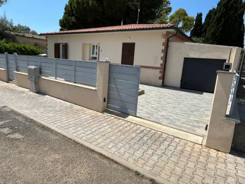 Venturina House | Casa Fellini - Giardino e parcheggio gratuito