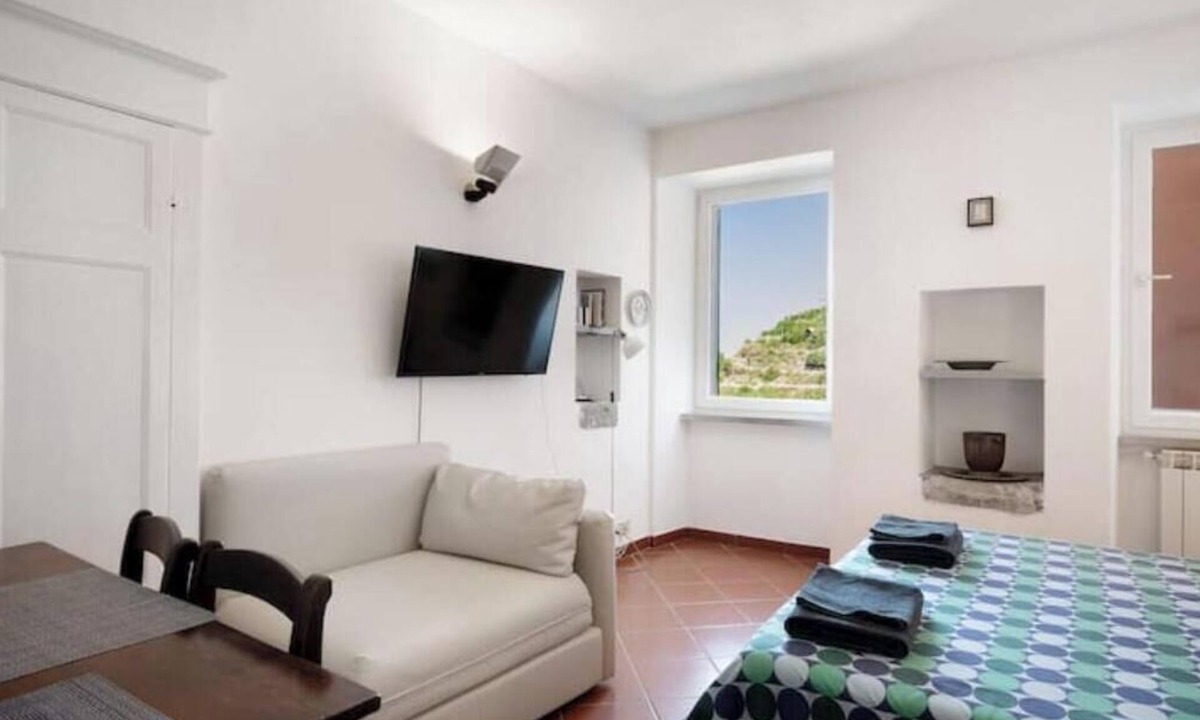 Manarola Apartment | Casestate Home Abroad - Dolphin | Ocean Views and Relaxation in the Heart of Manarola