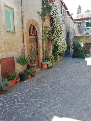 Barbarano Romano House | Charming House in Barbarano Romano with Terrace and Fireplace