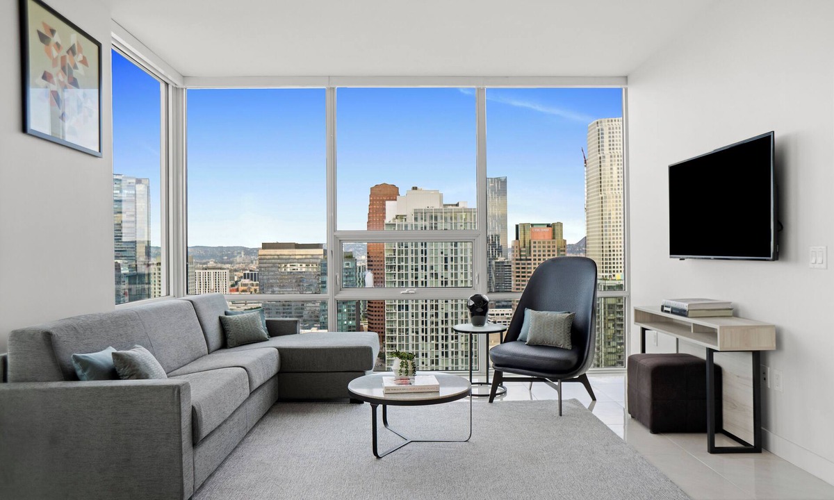 Downtown Los Angeles Apartment | Enjoy corner city views with two king beds and two bathrooms.