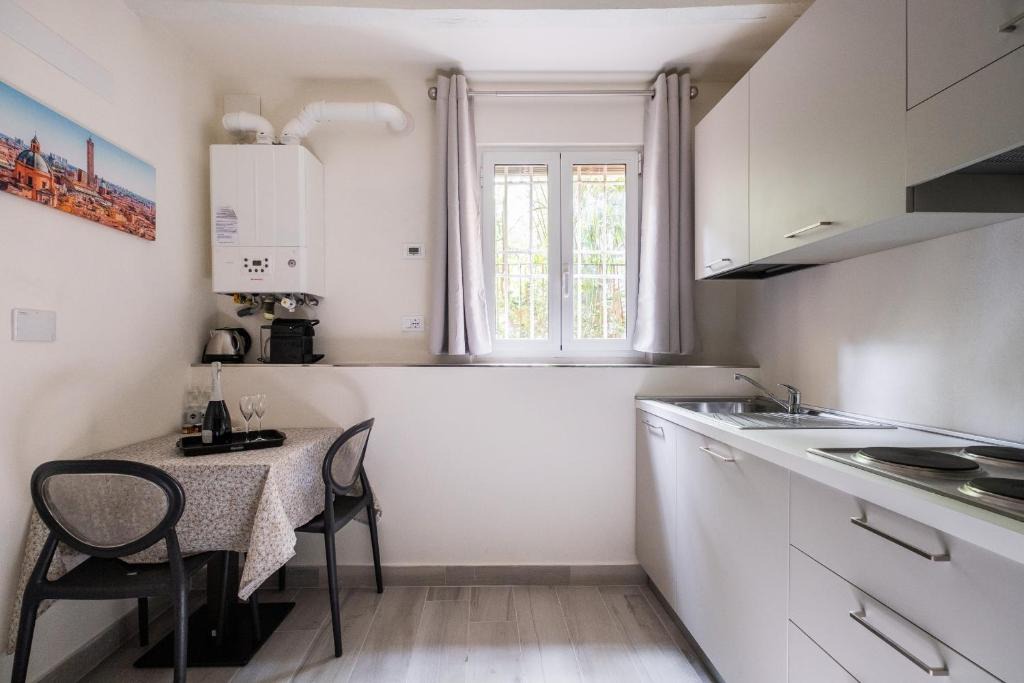 Historic Center Apartment | Giardini Margherita White Studio by Wonderful Italy