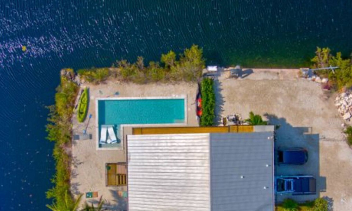 Port Pine Heights House | Monthly rental lap pool 40 ft dock wDavitz