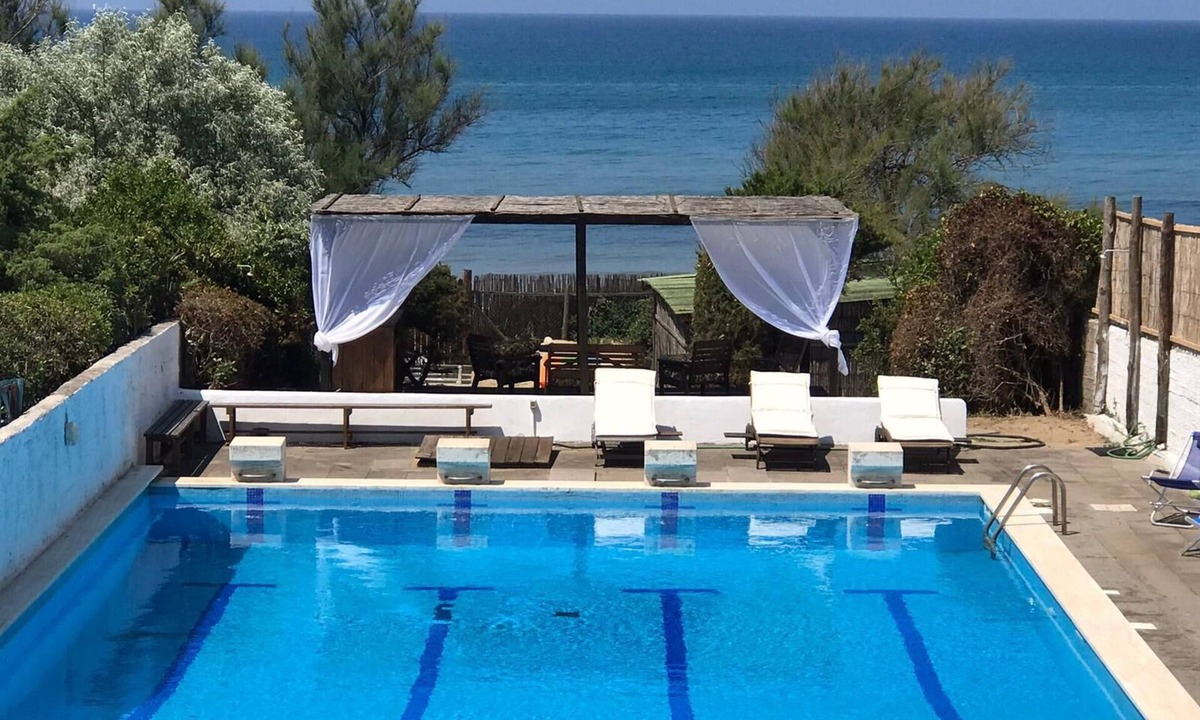 Latina Lido Villa | Palmetto Point on the beach - villa for 10 guests with 25x8 mt pool.