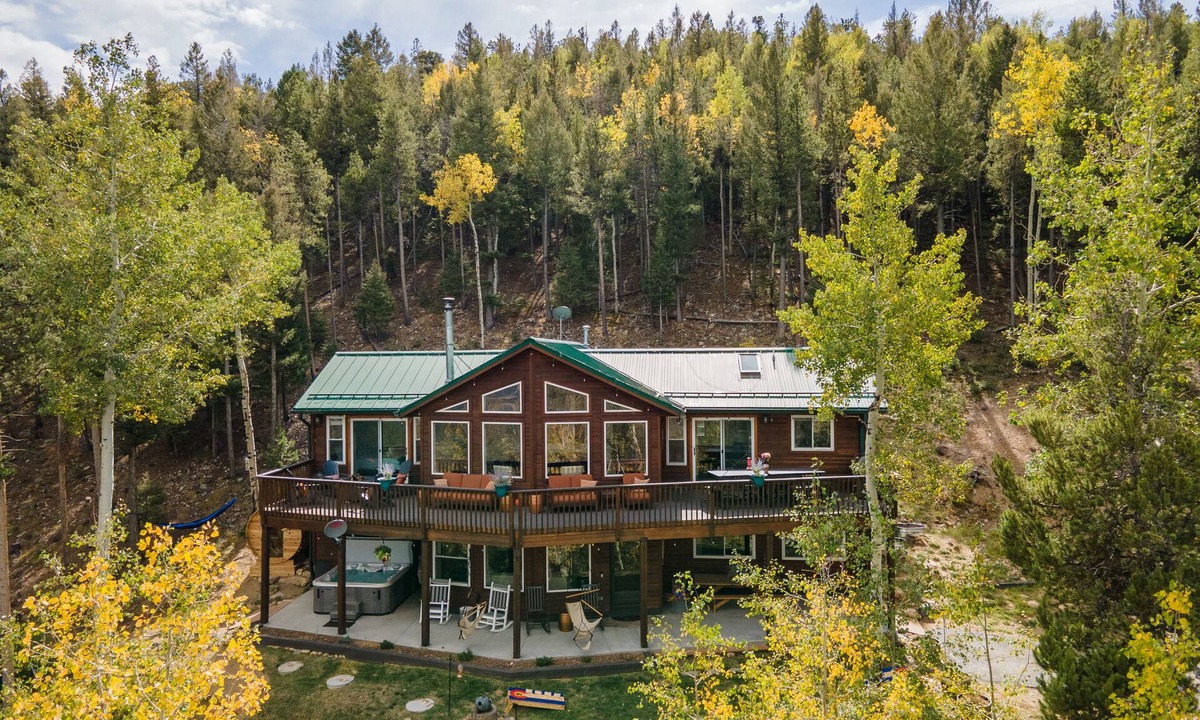 Conifer Mountain and Meadows House | Panoramic Views from a Large Peaktop Retreat with Hot Tub, Sauna, & Axe-Throwing