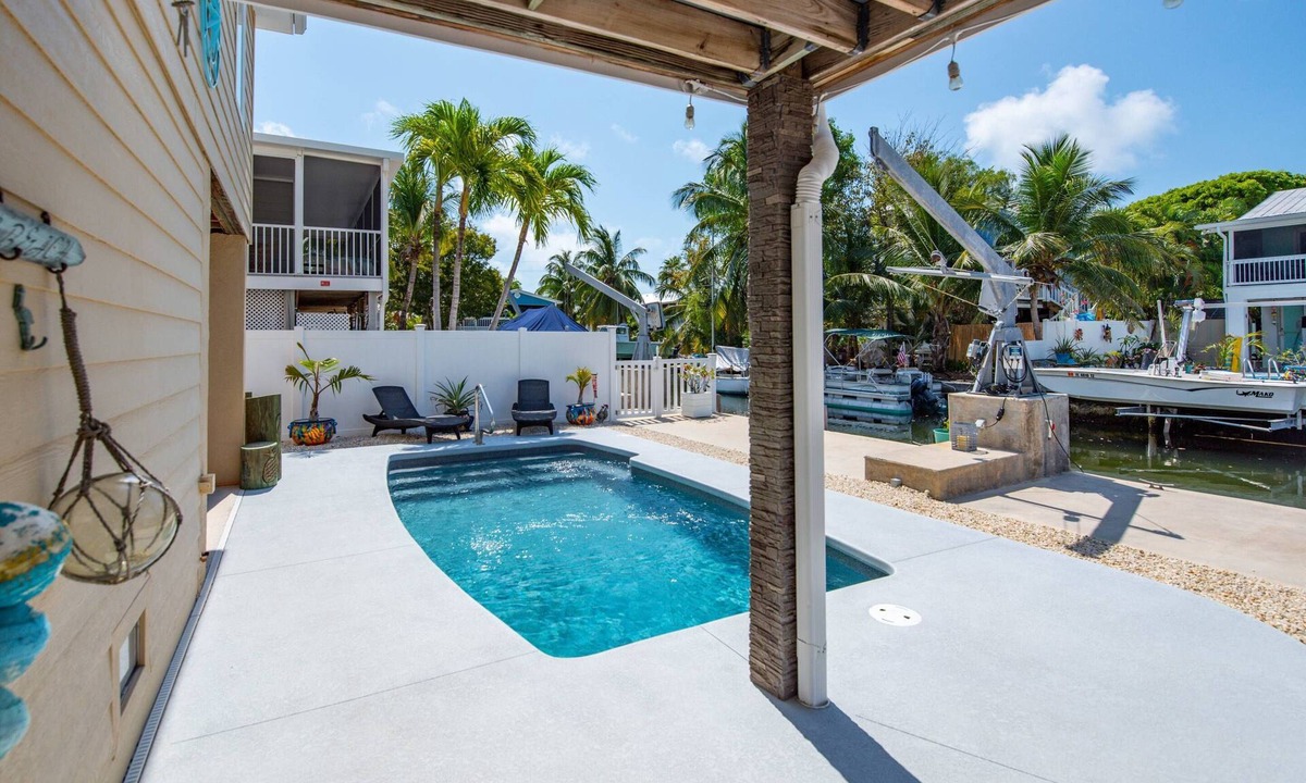 Cutthroat Harbor Estates House | Pirate’s Paradise: Waterfront 3BR Retreat on Cudjoe Key with Heated/Chilled Pool & Boat Dockage