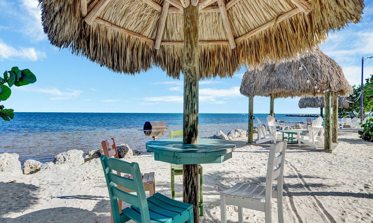 Rock Harbor Condo | Resort-style condo short walk from the ocean, includes golf cart.