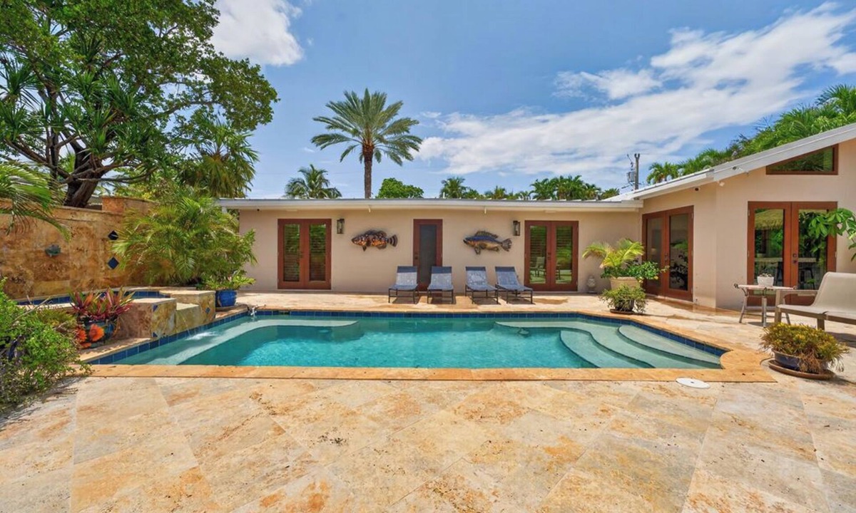 New Town House | RISE AND SHINE ~ Canal Front 3 BR/3Ba Home w/Heated Pool!