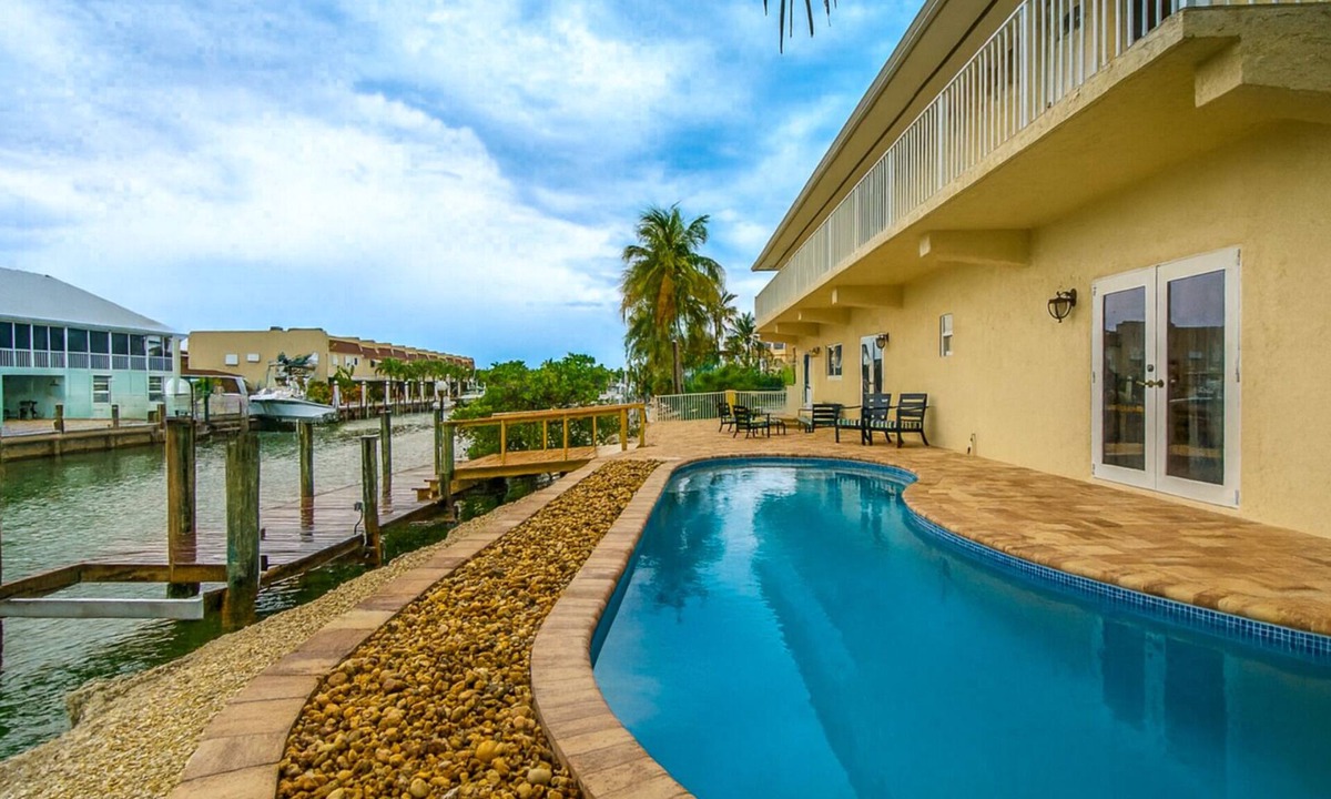 Marathon House | Salty Anglers: Waterfront Heated Pool, Dock & Walk to Sombrero Beach in Marathon