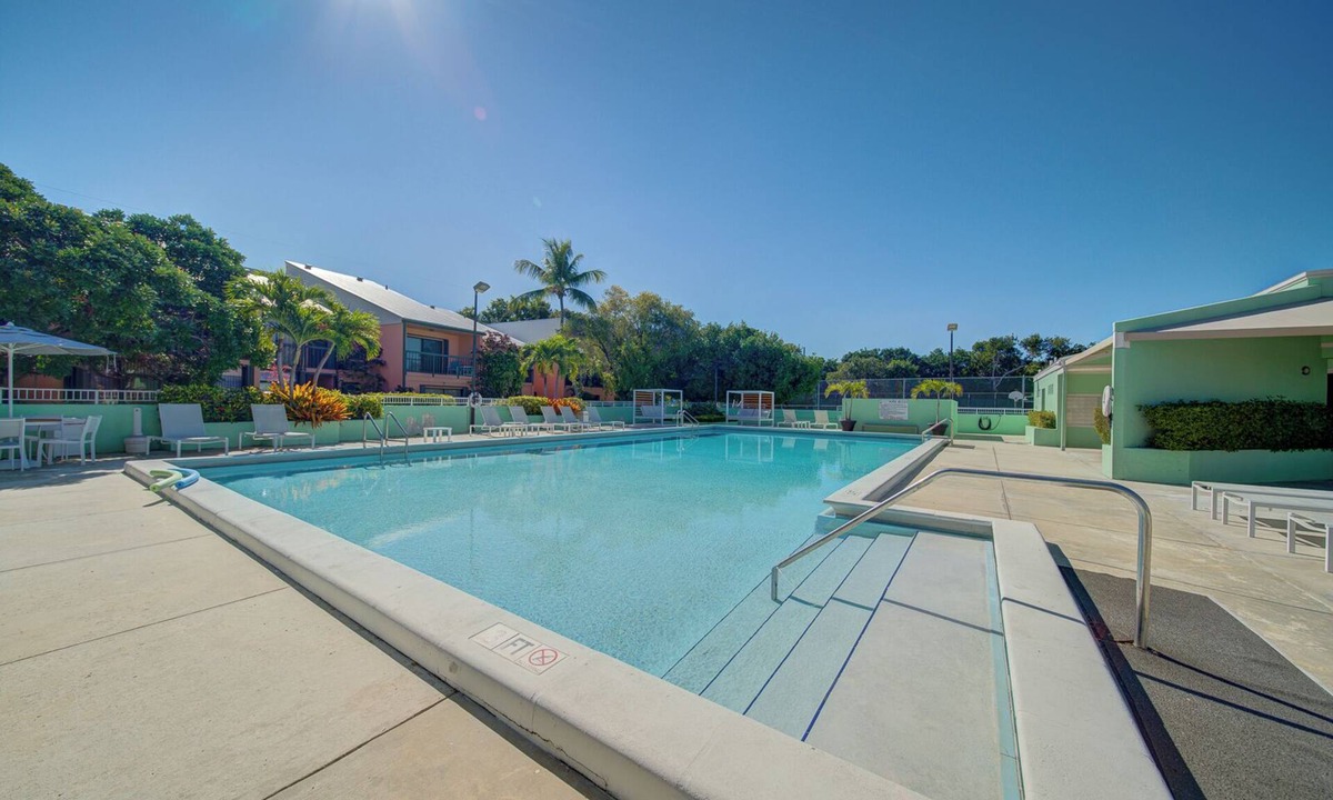 Rock Harbor Villa | Spacious 4-bedroom Key Largo Villa steps from the pool, pickleball, & marina.