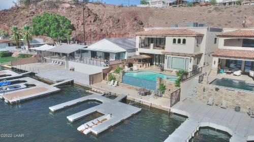 Cienega Springs House | Splash Landing | Riverfront Estate with Infinity Pool, Guest House & Private Docks