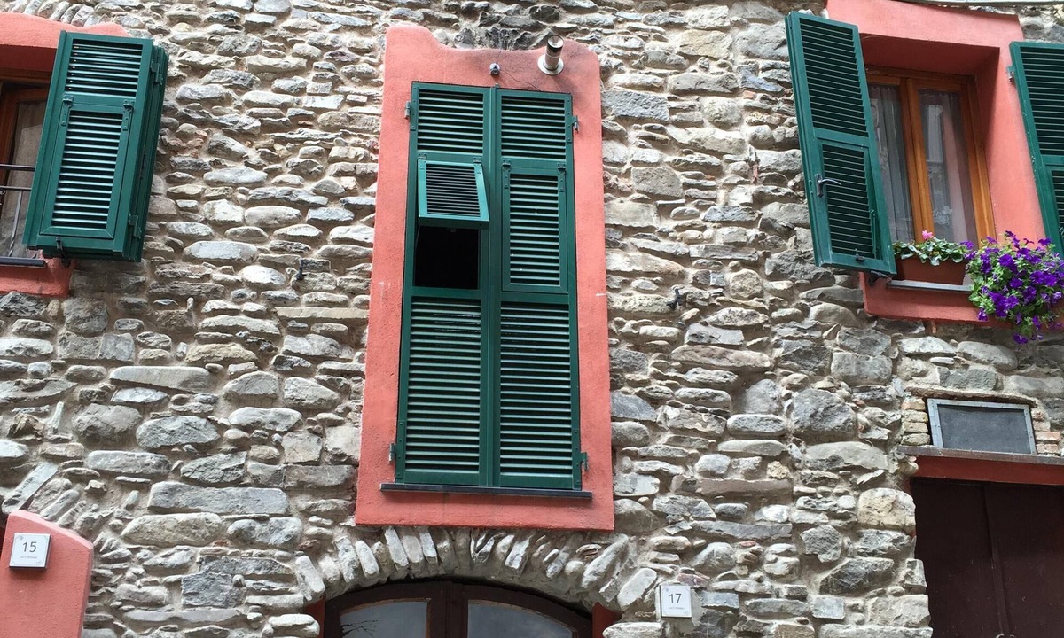 Isolabona Apartment | The attic from the fountain