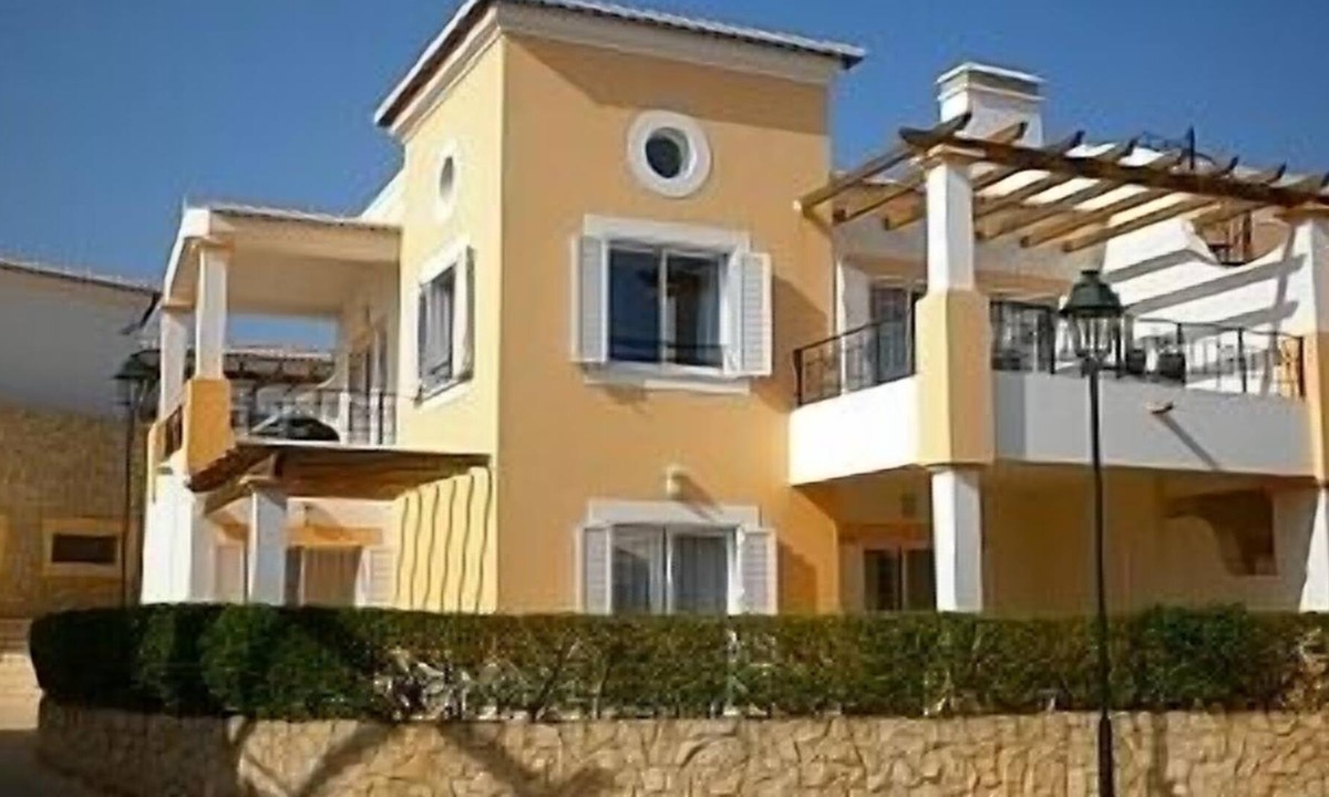 Salema House | Three Bedroom Town House With Communal Pool And Sea Views