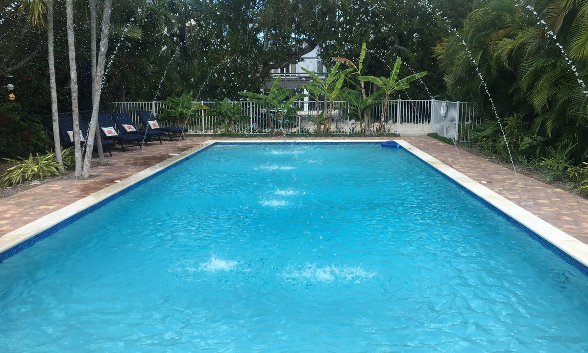 Eden Pines House | Tropical 5BR Paradise, Private Pool, Hot Tub, Canal Access – Sleeps 12