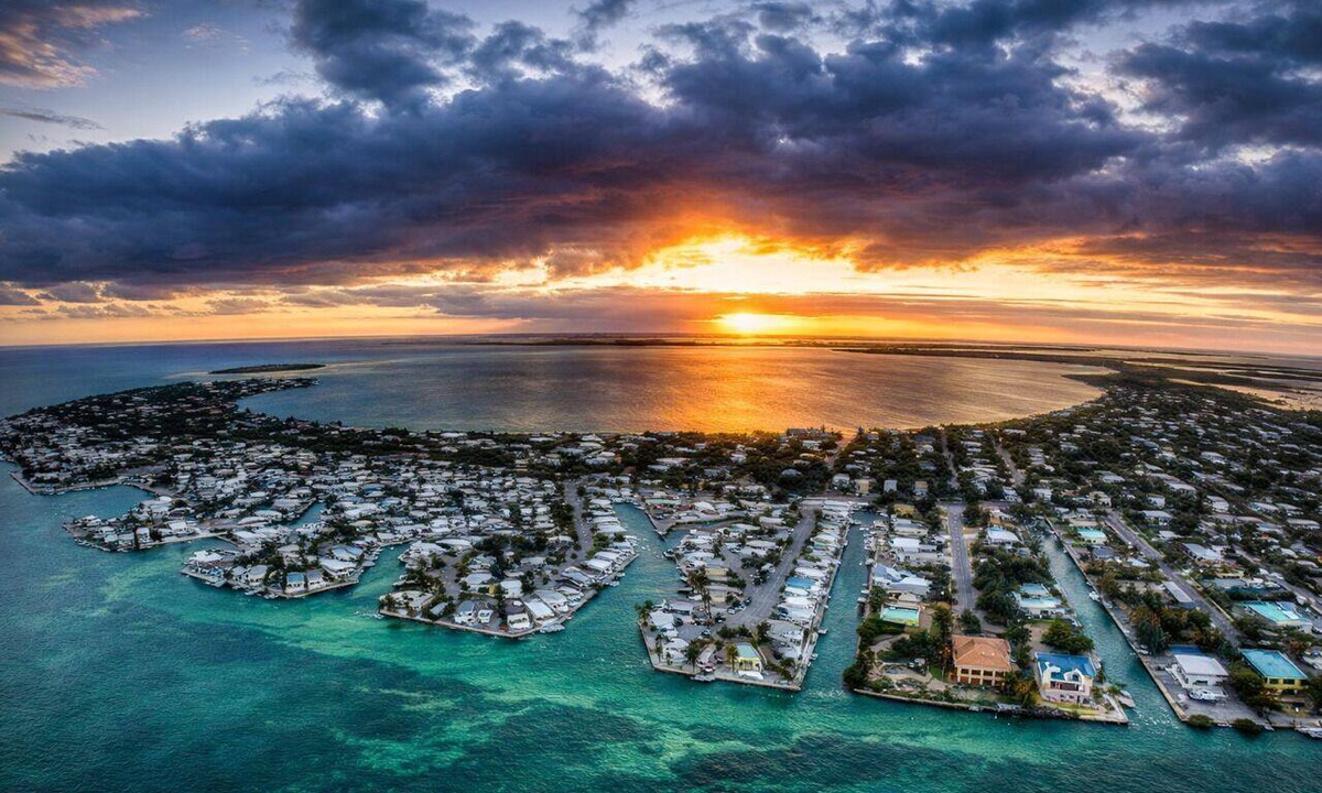 Cudjoe Key House | TWO HOMES A MID Rise and High Rise 85ft of Sea Wall.