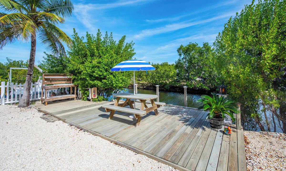 Port Pine Heights House | Updated Canal Home with Dock for 25' Boat, Sandbar Access & Backcountry Fishing