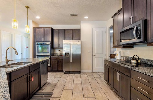 West Kissimmee Villa | 11BR Disney Golf Estate | Trackman, Theater, Spa