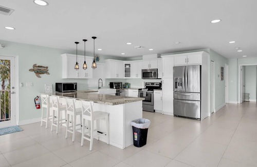 Key Colony Beach House | 5 BR House in charming Key Colony Beach with Pool & 50ft Dock