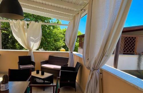 Lido di Capo Portiere Apartment | A CASA DI ELISA - Seaside Apartment - 100m from the beach