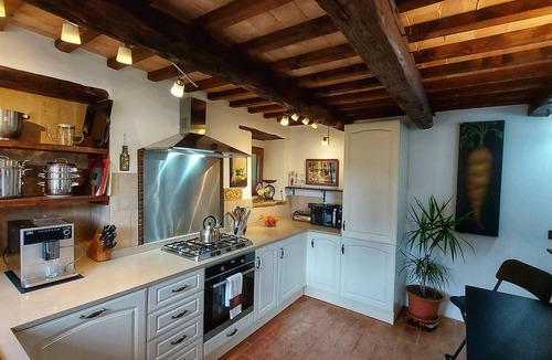 Penna San Giovanni House | A meticulously restored, historic Italian farmhouse with an incredible pool.