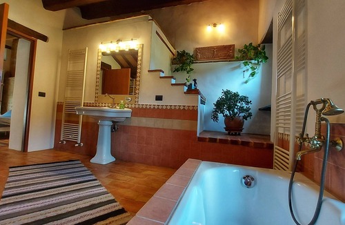 Penna San Giovanni House | A meticulously restored, historic Italian farmhouse with an incredible pool.