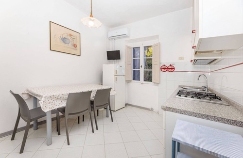 Magazzini Apartment | ACQUARIESE - CASA MARGOT