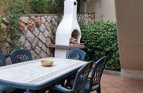 Porto Azzurro Apartment | Apartment 'Il Porto' Near the Beach with Balcony, Terrace & Garden