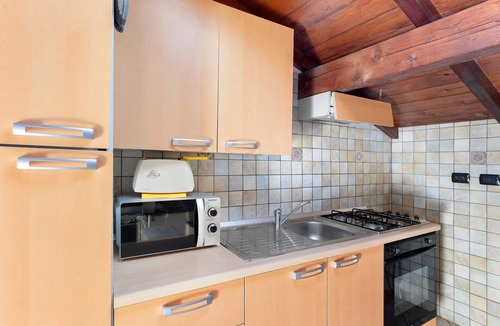 Cipressa Apartment | Apartment 'La Quiete Nel Bosco' with Sea View, Private Garden and Wi-Fi