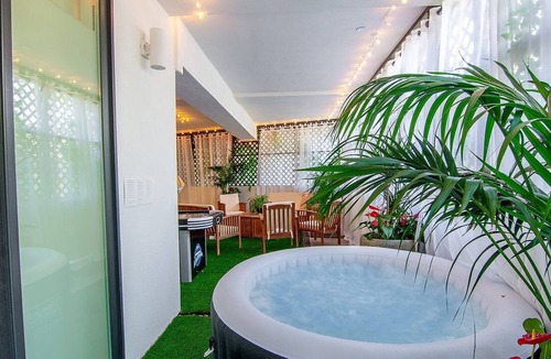 Pico - Robertson Apartment | Artfully arranged, open and inviting 2 bedroom suite with a private yard.