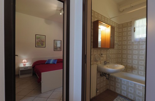 Susello Apartment | Attractive 2-room apartment with sunbath, pool and dream view
