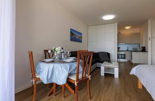 Susello Apartment | Attractive studio with balcony, pool and dream view