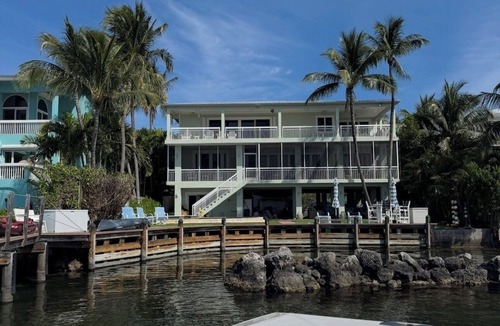 Tavernier House | Bayfront Serenity. 4 En-Suite Bedrooms. 1/2 bath. Elevator. Pool. Private Dock