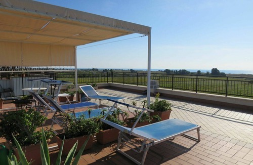 Marina di Cerveteri Apartment | Beautiful apartment for 5 guests with A/C, TV and patio
