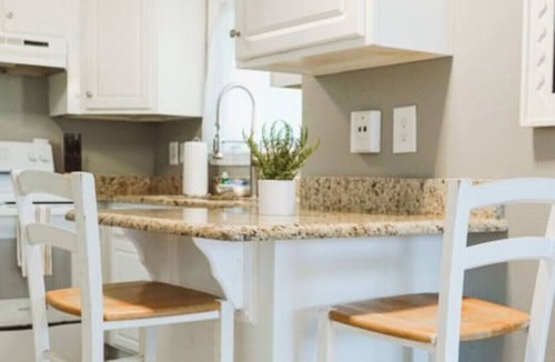 Butler Beach Condo | Blue Bungalow -Pool and Beach retreat!