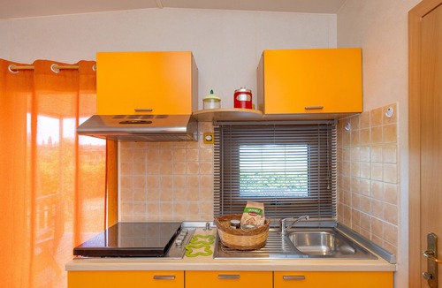 Bibbona House | Bungalow 'Stella 1' with Shared Pool, Private Terrace and Air Conditioning