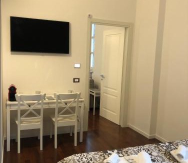 Rozzano Apartment | Camera Albergo - Suites Mansion