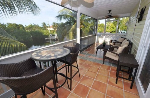 Breezeswept Beach Estates House | Cayman Cottage | 3 bed/2 bath canalfront home