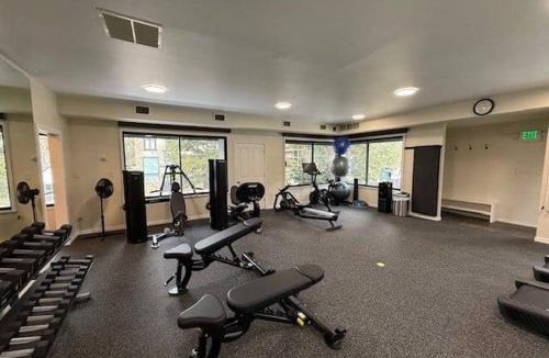 Aspen House | Chateau Eau Claire Unit 1, Stylish Condo Overlooking the River, Walking Distance to Downtown