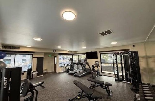Aspen House | Chateau Eau Claire Unit 18, Spacious Condo Overlooking the River with a Private Deck