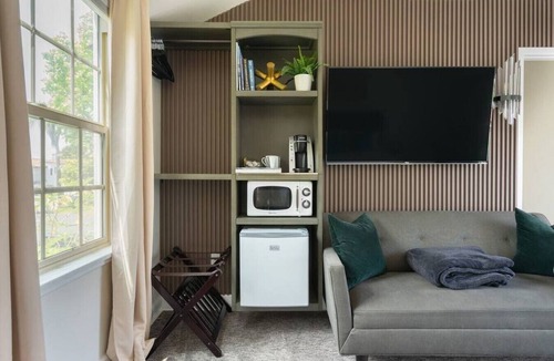 South Wrigley Condo | Chestnut Suite 102 with pool, hot tub & parking