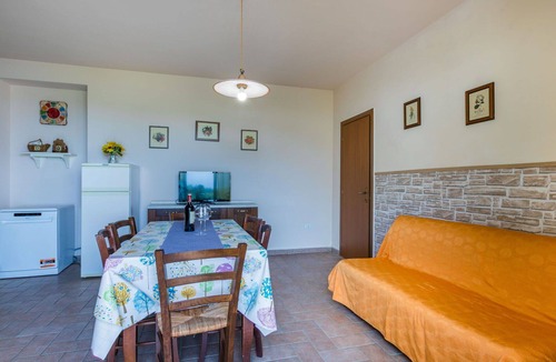 Castellina Marittima Apartment | Cosy apartment for 7 people with pool, A/C, WIFI, TV, patio, pets allowed and panoramic view