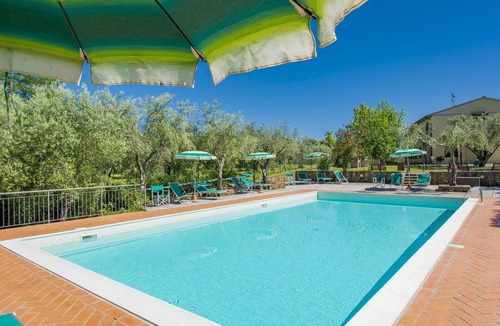 Casale Marittimo Apartment | Cosy apartment for 6 guests with pool, WIFI, TV, patio and pets allowed
