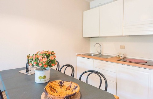 Marina di Bibbona Apartment | Cosy apartment for 4 people with A/C, pool, WIFI, TV and patio