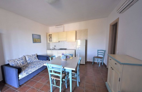 Follonica Apartment | Cosy apartment for 6 guests with A/C, pool, TV, patio and pets allowed