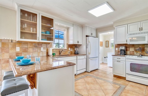 Marathon House | Delightful Canal-Front Home with Private Pool, Gas Grill, WiFi, & Water Views