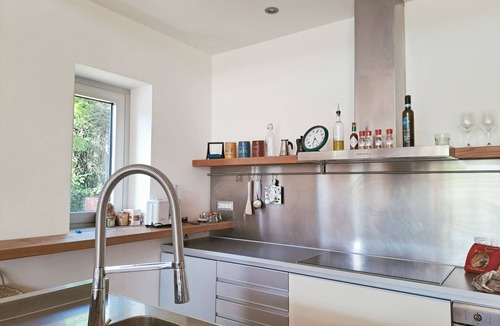 Monte Caminetto Apartment | Discover the unique charm of Villa New Star in Sacrofano, an architectural masterpiece nestled in th